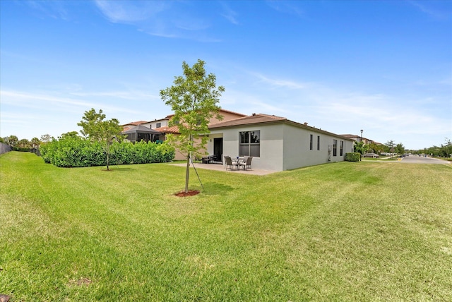 16390 Sea Turtle Pl, The Acreage, FL 33470 - view of yard featuring a patio area