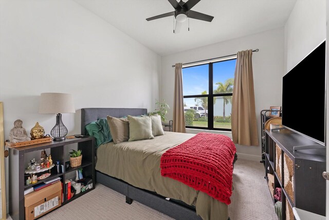 16390 Sea Turtle Pl, The Acreage, FL 33470 - carpeted bedroom with lofted ceiling and a ceiling fan