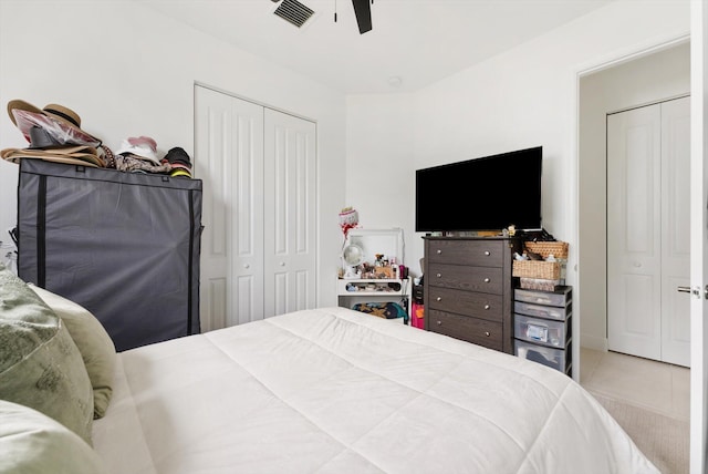 16390 Sea Turtle Pl, The Acreage, FL 33470 - tiled bedroom with a ceiling fan, visible vents, and a closet