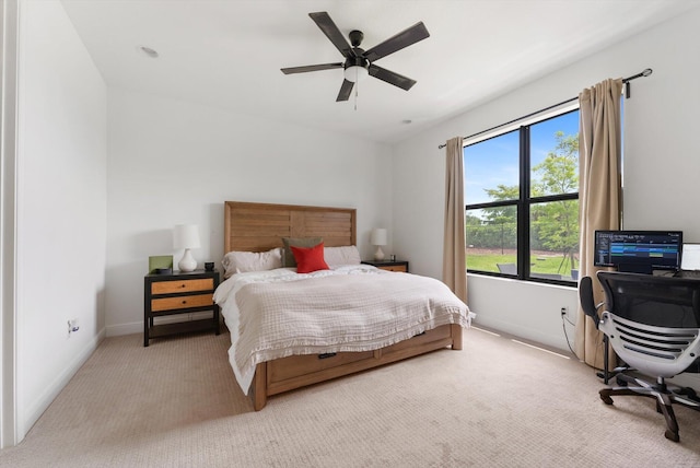 16390 Sea Turtle Pl, The Acreage, FL 33470 - bedroom featuring ceiling fan, baseboards, and light colored carpet