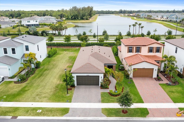 16390 Sea Turtle Pl, The Acreage, FL 33470 - bird's eye view with a residential view and a water view
