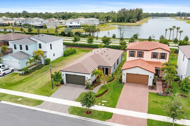 16390 Sea Turtle Pl, The Acreage, FL 33470 - drone / aerial view with a residential view and a water view