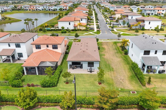 16390 Sea Turtle Pl, The Acreage, FL 33470 - bird's eye view with a residential view and a water view