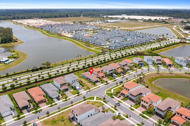 16390 Sea Turtle Pl, The Acreage, FL 33470 - birds eye view of property featuring a residential view and a water view