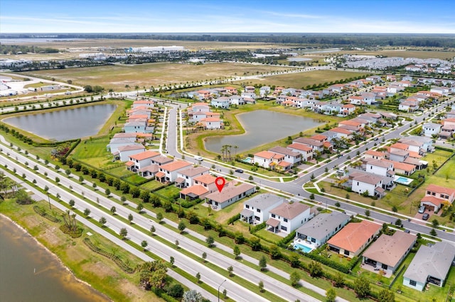 16390 Sea Turtle Pl, The Acreage, FL 33470 - drone / aerial view featuring a residential view and a water view