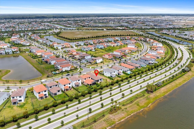 16390 Sea Turtle Pl, The Acreage, FL 33470 - birds eye view of property featuring a residential view and a water view