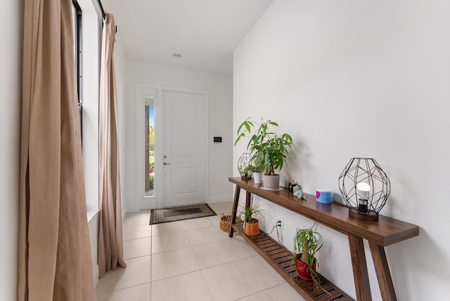 16390 Sea Turtle Pl, The Acreage, FL 33470 - foyer featuring light tile patterned flooring