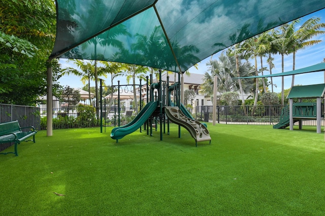 2560 NW 70th Blvd, Boca Raton, FL 33496 - community playground featuring fence and a yard