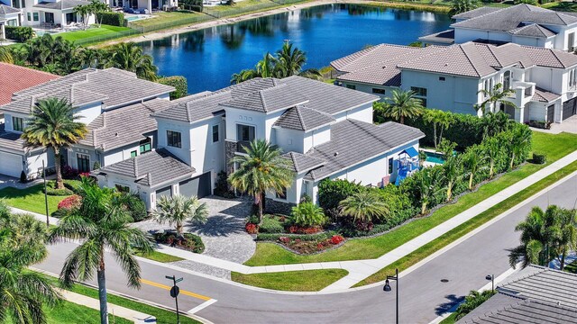 2560 NW 70th Blvd, Boca Raton, FL 33496 - drone / aerial view featuring a residential view and a water view