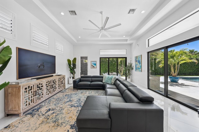 2560 NW 70th Blvd, Boca Raton, FL 33496 - living room featuring a raised ceiling, visible vents, a ceiling fan, and recessed lighting