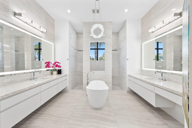 2560 NW 70th Blvd, Boca Raton, FL 33496 - full bathroom with two vanities, a sink, and a walk in shower