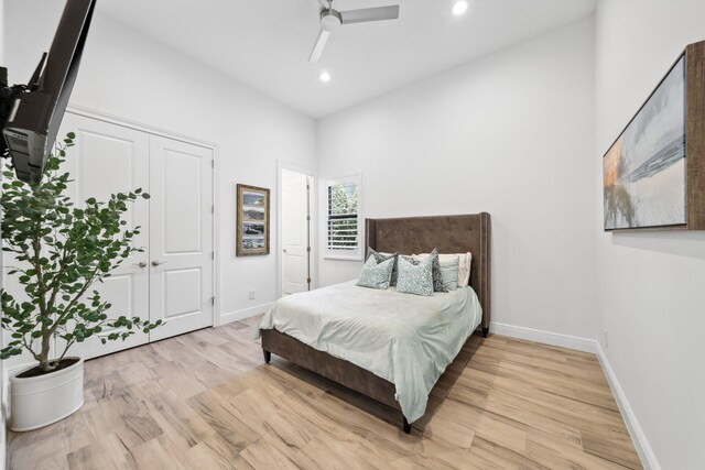 2560 NW 70th Blvd, Boca Raton, FL 33496 - bedroom featuring baseboards, recessed lighting, and light wood-type flooring