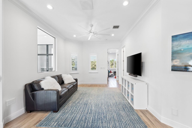 2560 NW 70th Blvd, Boca Raton, FL 33496 - living room with ornamental molding, recessed lighting, and light wood-type flooring
