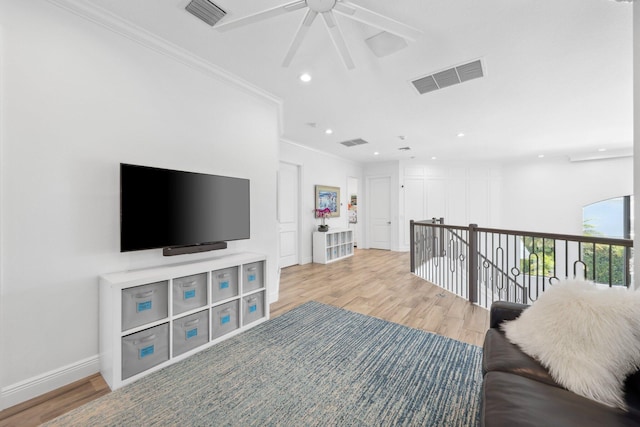 2560 NW 70th Blvd, Boca Raton, FL 33496 - living area featuring wood finished floors, visible vents, ceiling fan, and ornamental molding