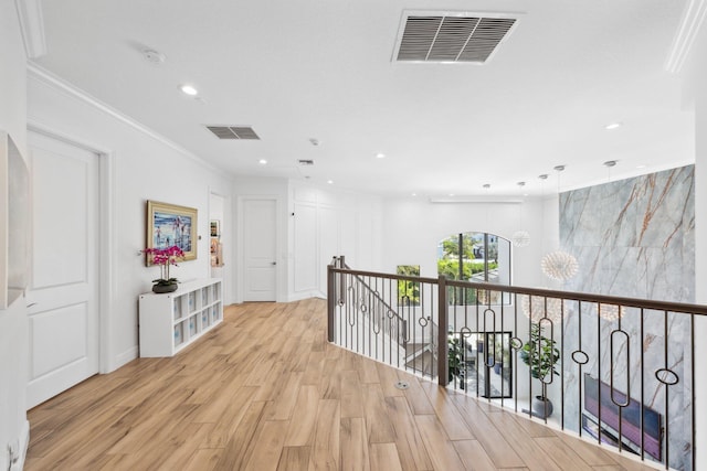 2560 NW 70th Blvd, Boca Raton, FL 33496 - hall featuring ornamental molding, recessed lighting, visible vents, and light wood-type flooring