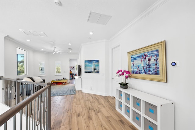 2560 NW 70th Blvd, Boca Raton, FL 33496 - hallway with recessed lighting, light wood-type flooring, visible vents, baseboards, and ornamental molding