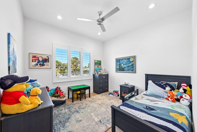 2560 NW 70th Blvd, Boca Raton, FL 33496 - bedroom with recessed lighting, a ceiling fan, wood finished floors, and baseboards