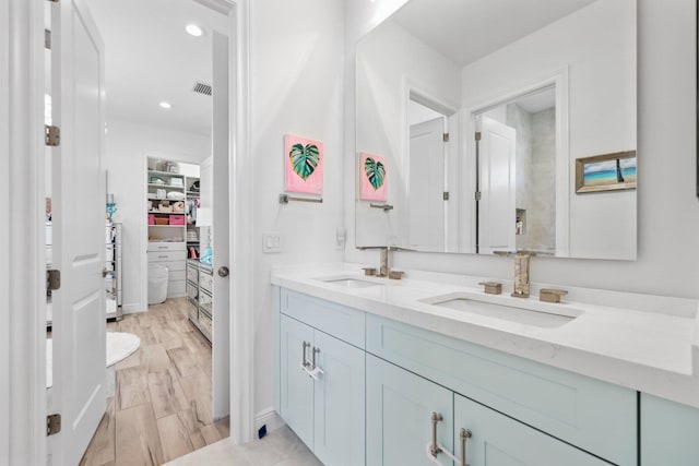 2560 NW 70th Blvd, Boca Raton, FL 33496 - full bath featuring recessed lighting, double vanity, a sink, and a spacious closet
