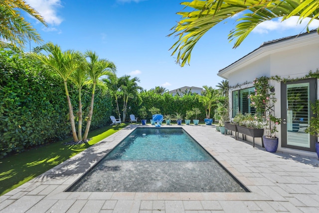 2560 NW 70th Blvd, Boca Raton, FL 33496 - view of pool featuring a patio area and a fenced in pool