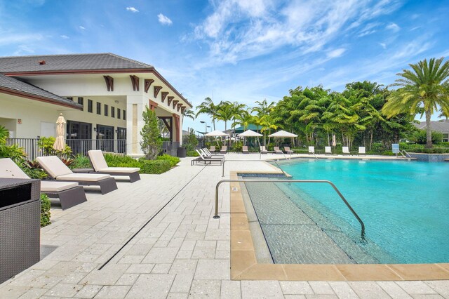 2560 NW 70th Blvd, Boca Raton, FL 33496 - community pool featuring fence and a patio area