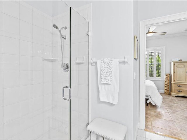 ensuite bathroom featuring a shower stall and connected bathroom