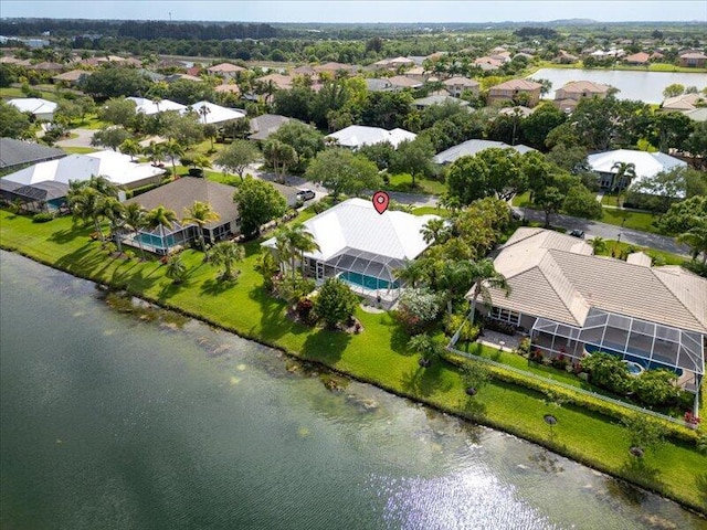 aerial view featuring a water view and a residential view