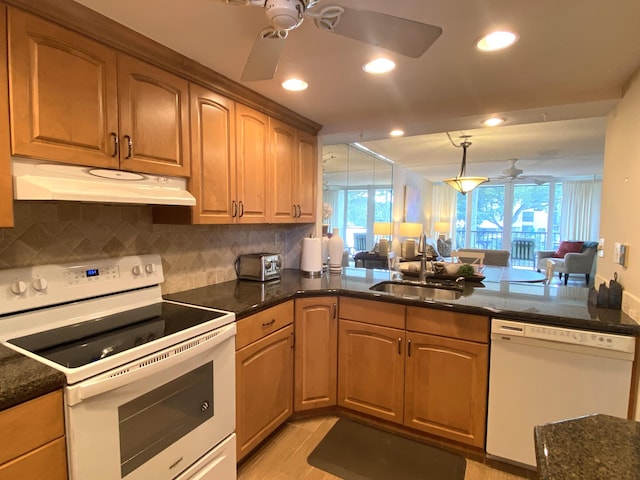 7 Royal Palm Way Unit 202, Boca Raton, FL 33432 - kitchen featuring white appliances, ceiling fan, under cabinet range hood, tasteful backsplash, and recessed lighting