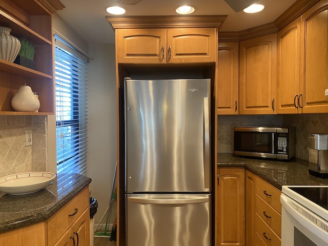 7 Royal Palm Way Unit 202, Boca Raton, FL 33432 - kitchen featuring appliances with stainless steel finishes, decorative backsplash, open shelves, dark stone countertops, and recessed lighting