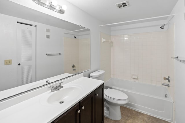 full bath with visible vents, shower / bathtub combination, toilet, vanity, and tile patterned flooring
