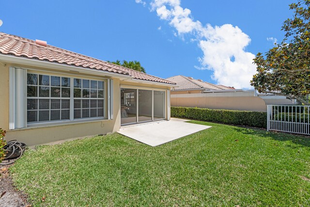 exterior space with a patio and fence