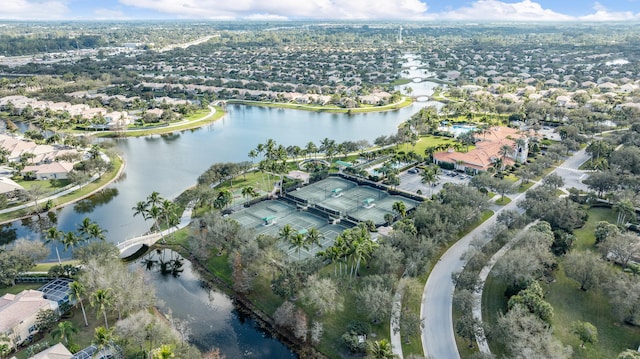 bird's eye view featuring a water view and a residential view