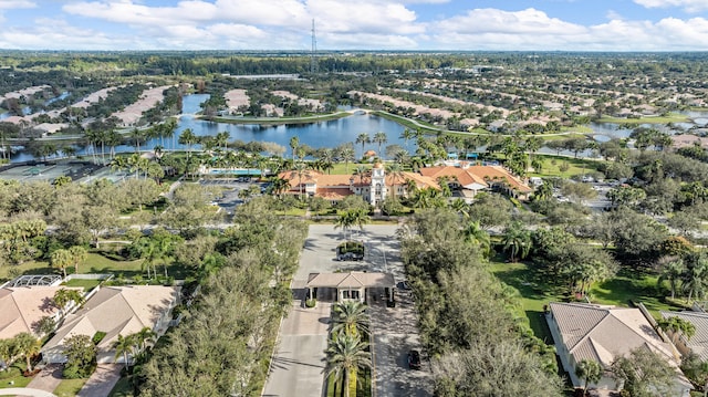 birds eye view of property with a residential view and a water view