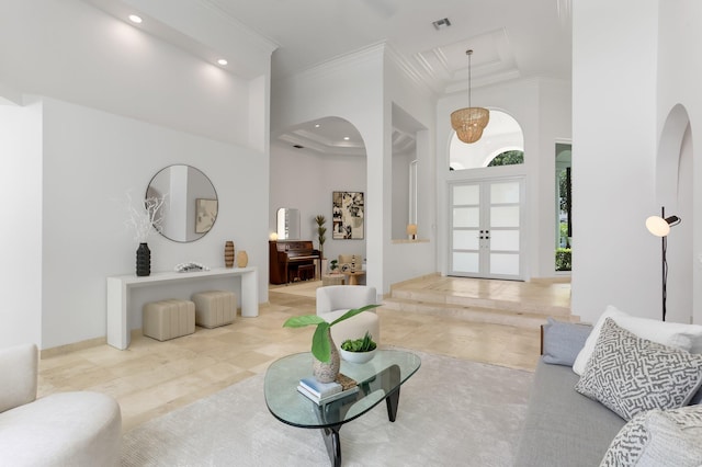 6247 NW 33rd Ave, Boca Raton, FL 33496 - tiled living area featuring french doors, a towering ceiling, recessed lighting, and crown molding
