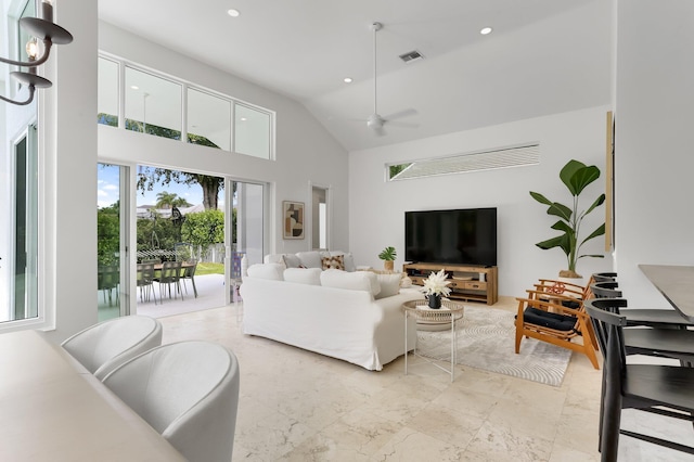 6247 NW 33rd Ave, Boca Raton, FL 33496 - living room with high vaulted ceiling, ceiling fan, visible vents, and recessed lighting