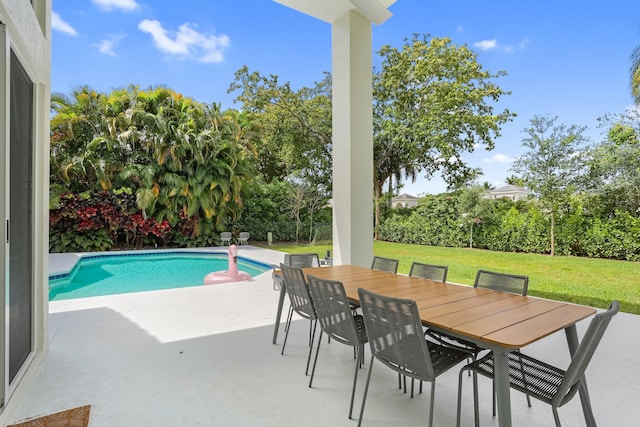 6247 NW 33rd Ave, Boca Raton, FL 33496 - outdoor pool featuring a patio area, a lawn, and outdoor dining area