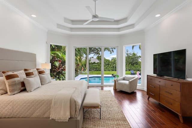 6247 NW 33rd Ave, Boca Raton, FL 33496 - bedroom with recessed lighting, dark wood-style floors, a raised ceiling, access to exterior, and crown molding