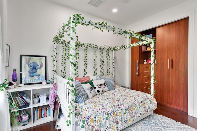 6247 NW 33rd Ave, Boca Raton, FL 33496 - bedroom with baseboards, wood finished floors, visible vents, and recessed lighting