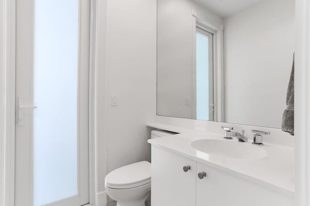 6247 NW 33rd Ave, Boca Raton, FL 33496 - bathroom featuring vanity and toilet