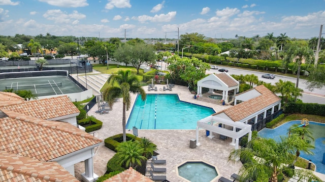 6247 NW 33rd Ave, Boca Raton, FL 33496 - pool with fence, a gazebo, a hot tub, and a patio