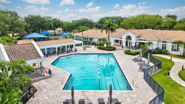 6247 NW 33rd Ave, Boca Raton, FL 33496 - pool featuring fence, a pergola, and a patio