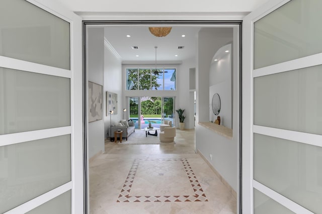 6247 NW 33rd Ave, Boca Raton, FL 33496 - hall with recessed lighting, a towering ceiling, and baseboards