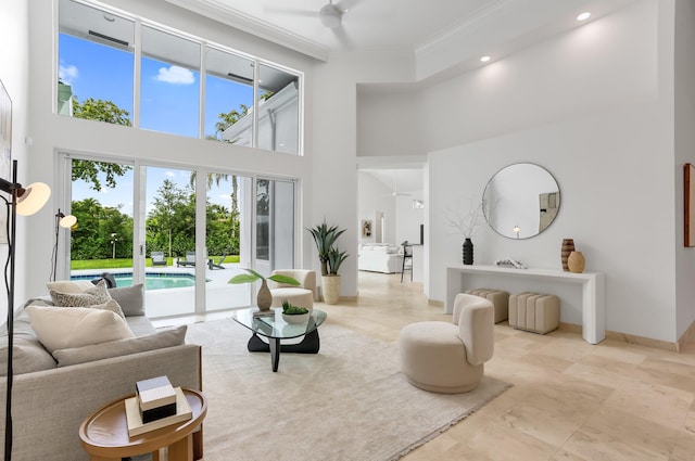 6247 NW 33rd Ave, Boca Raton, FL 33496 - living room with ornamental molding, a towering ceiling, ceiling fan, and a healthy amount of sunlight