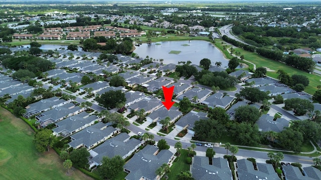 252 Brier Cir, Jupiter, FL 33458 - aerial view of property's location with a nearby body of water, nearby suburban area, and a golf course