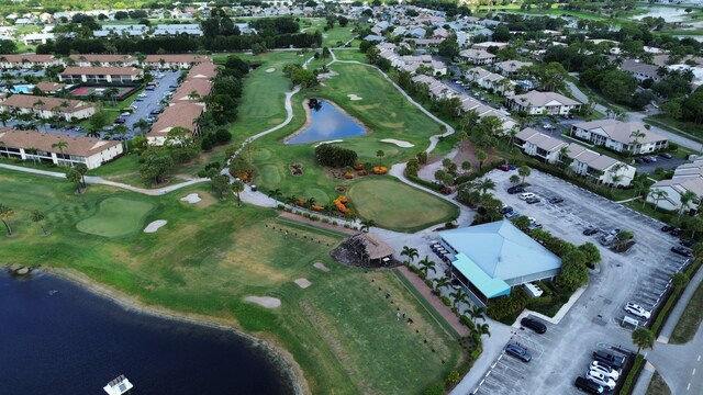 252 Brier Cir, Jupiter, FL 33458 - aerial view of property and surrounding area featuring a nearby body of water, nearby suburban area, and a golf course
