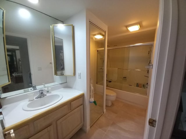 1213 12th Ter, Palm Beach Gardens, FL 33418 - bathroom with toilet, vanity, shower / bathtub combination, and tile patterned floors