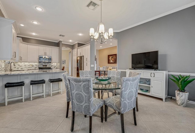 dining area featuring recessed lighting, an inviting chandelier, crown molding, and light tile patterned floors