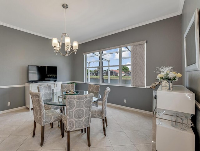 dining area with baseboards, an inviting chandelier, light tile patterned floors, and crown molding
