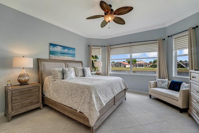 bedroom with a water view, baseboards, ornamental molding, and light tile patterned floors