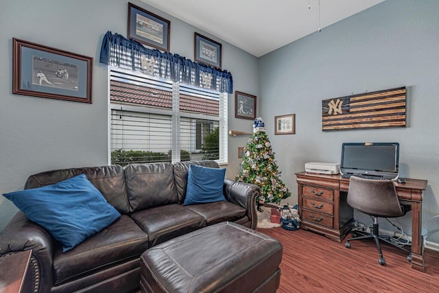 office space with a ceiling fan and wood finished floors