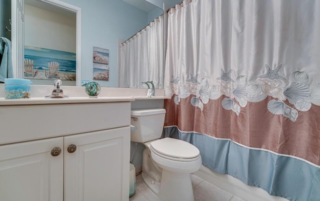 full bathroom featuring tile patterned floors, vanity, a shower with shower curtain, and toilet